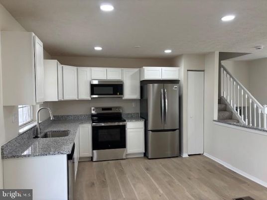 Interior, Kitchen, Recessed Lighting, Stainless Steel Appliances, Wood Texture Flooring