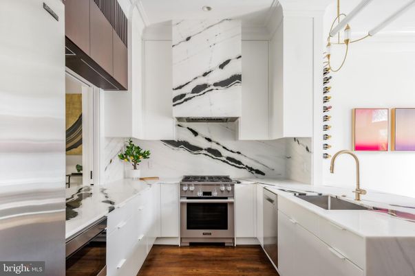 Interior, Kitchen, Marble Walls, Stainless Steel Appliances, Wood Texture Flooring