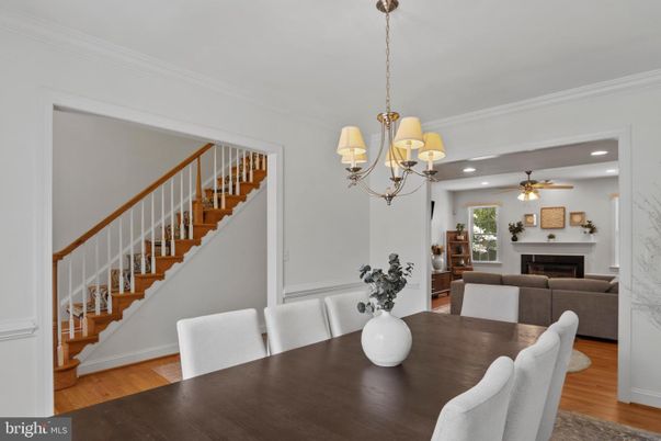 Chandelier, Dining room, Fireplace, Interior, Living room, Recessed Lighting, Wood Texture Flooring