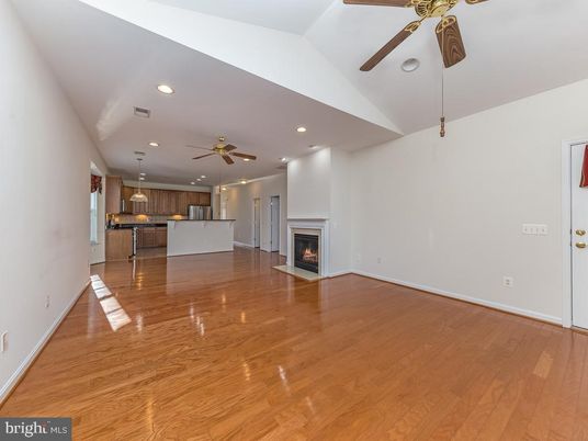 Empty room, Fireplace, Interior, Kitchen, Pendant Lights, Recessed Lighting, Wood Texture Flooring