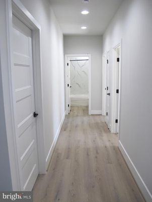 Interior, Marble Walls, Recessed Lighting, Wood Texture Flooring