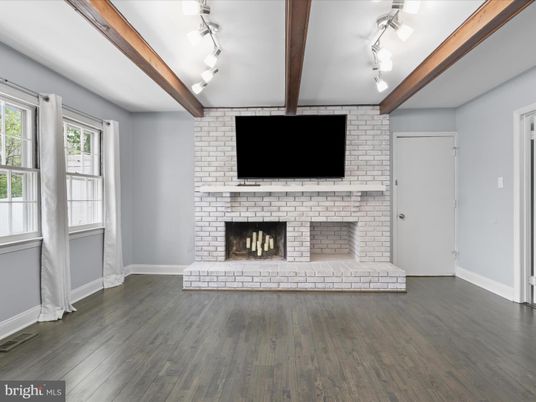 Empty room, Fireplace, Interior, Stone Walls, Wooden Beams, Wood Texture Flooring