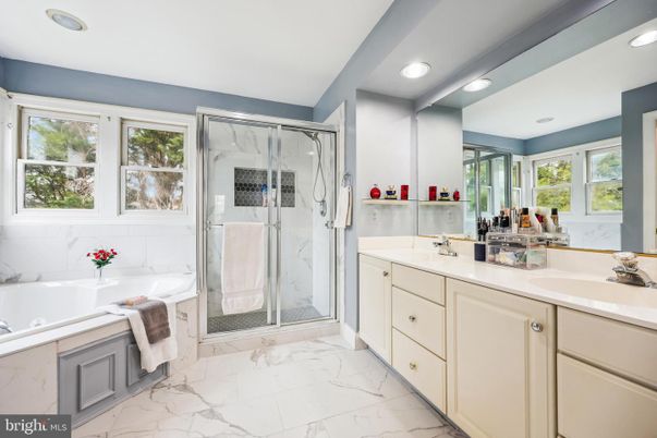 Bathroom, Dual Sink Vanities, Glass Shower, Interior, Marble, Marble Walls, Recessed Lighting