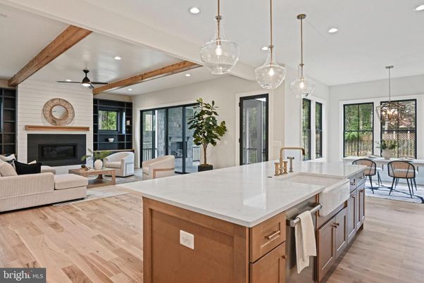Dining room, Fireplace, Interior, Kitchen, Living room, Pendant Lights, Recessed Lighting, Stone Walls, Wooden Beams, Wood Texture Flooring