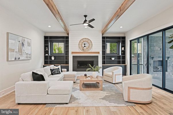 Fireplace, Interior, Living room, Recessed Lighting, Stone Walls, Wooden Beams, Wood Texture Flooring