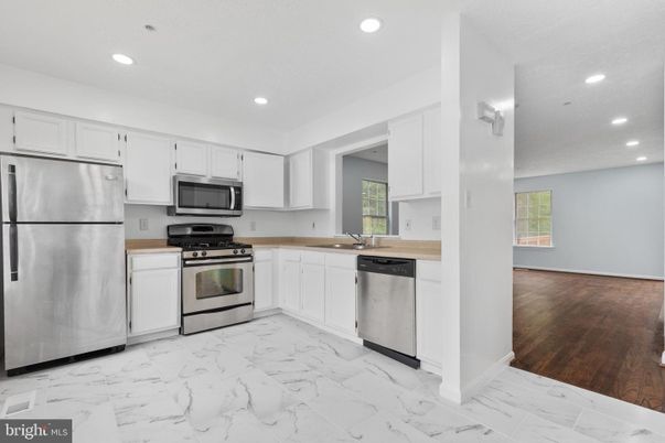 Interior, Kitchen, Marble, Recessed Lighting, Stainless Steel Appliances, Wood Texture Flooring