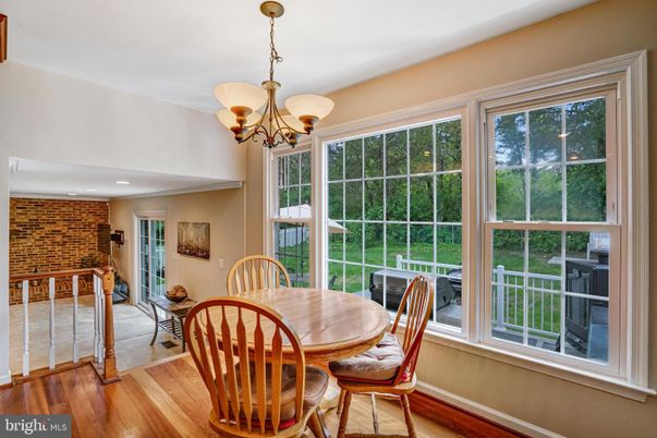 Chandelier, Dining room, Interior, Recessed Lighting, Stone Walls, Wood Texture Flooring