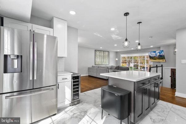 Interior, Kitchen, Living room, Marble, Pendant Lights, Recessed Lighting, Stainless Steel Appliances, Wood Texture Flooring