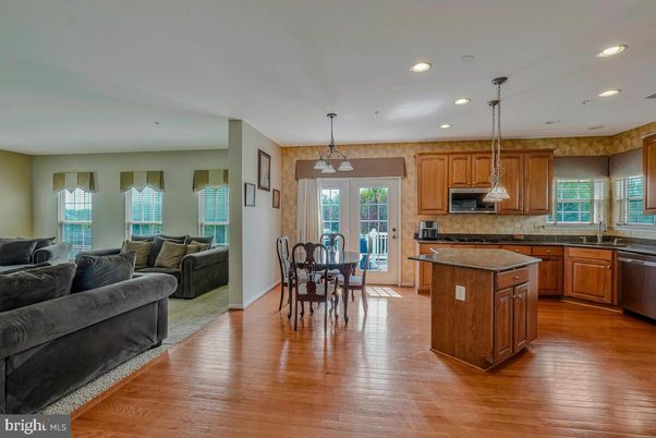 Dining room, Interior, Kitchen, Living room, Pendant Lights, Recessed Lighting, Stainless Steel Appliances, Wood Texture Flooring