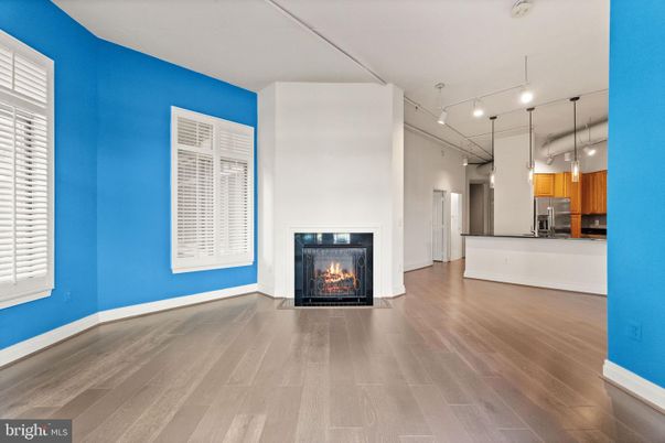 Empty room, Fireplace, Interior, Kitchen, Pendant Lights, Wood Texture Flooring
