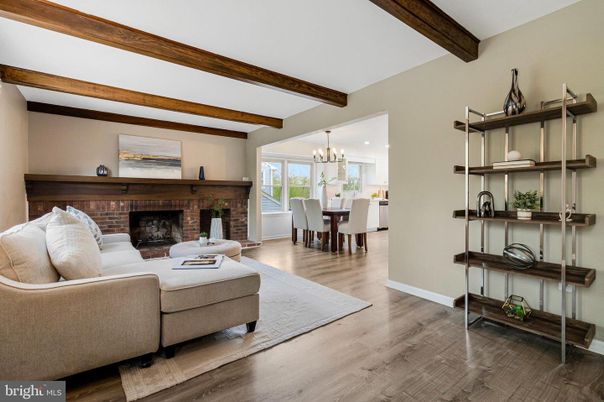Chandelier, Dining room, Fireplace, Interior, Living room, Recessed Lighting, Wooden Beams, Wood Texture Flooring