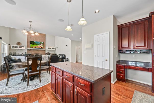 Dining room, Fireplace, Interior, Kitchen, Pendant Lights, Recessed Lighting, Stone Walls, Wood Texture Flooring