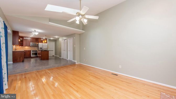 Empty room, Interior, Kitchen, Stainless Steel Appliances, Wood Texture Flooring