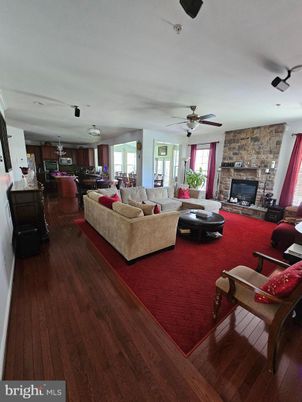 Fireplace, Interior, Living room, Pendant Lights, Stone Walls, Wood Texture Flooring