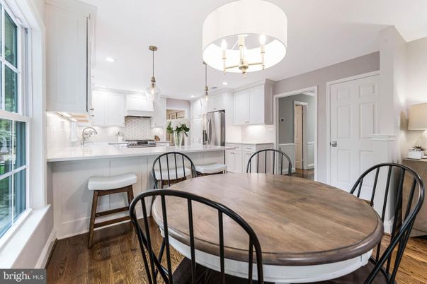 Dining room, Interior, Kitchen, Pendant Lights, Recessed Lighting, Stainless Steel Appliances, Wood Texture Flooring