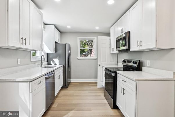 Interior, Kitchen, Recessed Lighting, Stainless Steel Appliances, Wood Texture Flooring