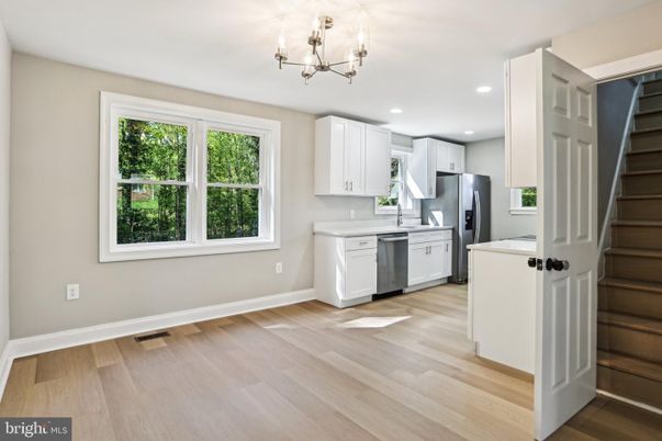 Chandelier, Interior, Kitchen, Recessed Lighting, Stainless Steel Appliances, Wood Texture Flooring
