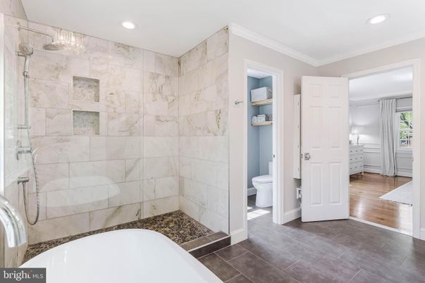 Bathroom, Glass Shower, Interior, Marble Walls, Recessed Lighting, Wood Texture Flooring