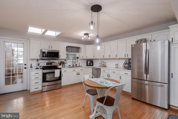Interior, Kitchen, Pendant Lights, Stainless Steel Appliances, Wood Texture Flooring