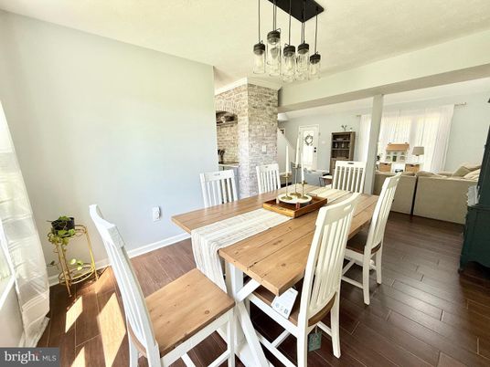 Dining room, Fireplace, Interior, Living room, Pendant Lights, Stone Walls, Wood Texture Flooring