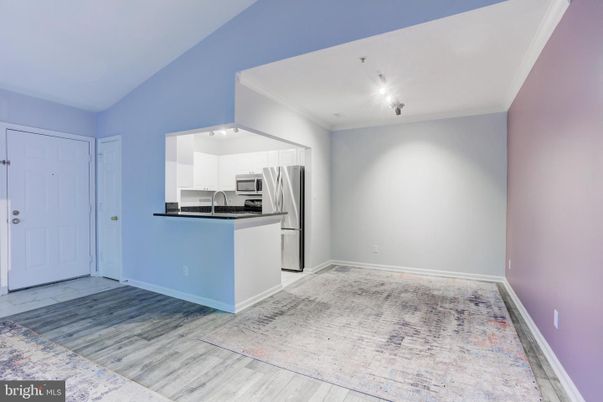 Empty room, Interior, Kitchen, Stainless Steel Appliances, Wood Texture Flooring