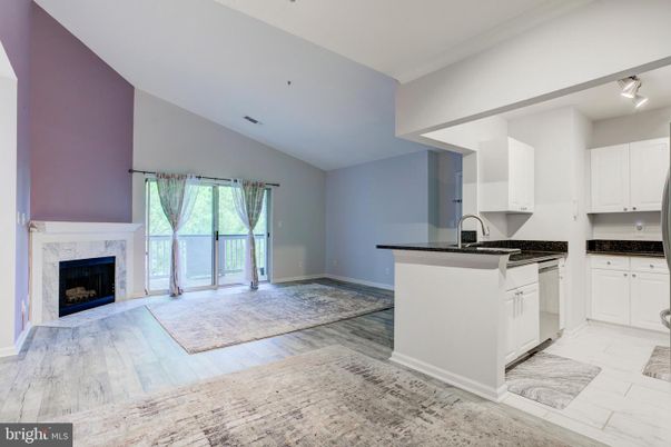 Fireplace, Interior, Kitchen, Recessed Lighting, Wood Texture Flooring