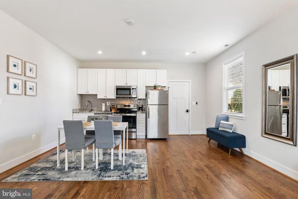 Dining room, Interior, Kitchen, Recessed Lighting, Stainless Steel Appliances, Wood Texture Flooring