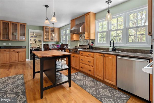 Dining room, Interior, Kitchen, Pendant Lights, Stainless Steel Appliances, Wood Texture Flooring