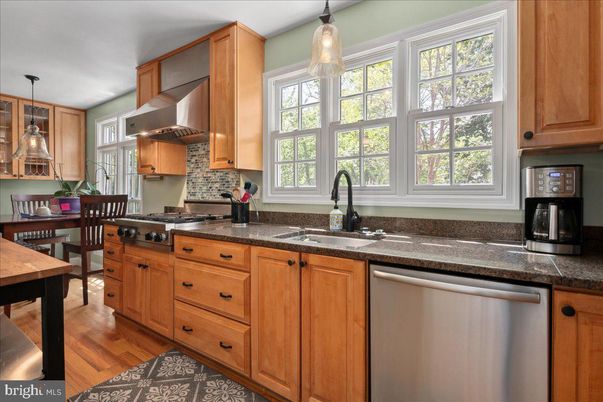 Dining room, Interior, Kitchen, Pendant Lights, Stainless Steel Appliances, Wood Texture Flooring
