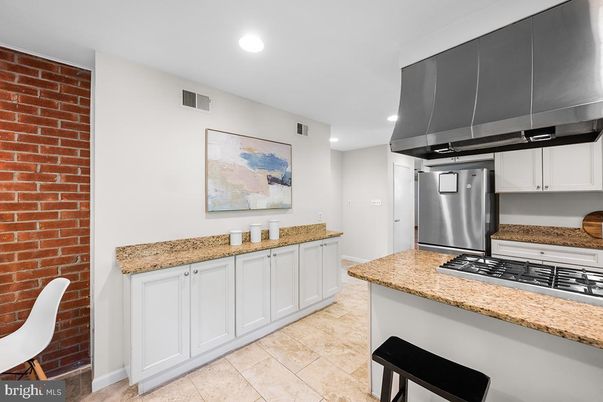 Interior, Kitchen, Recessed Lighting, Stainless Steel Appliances, Stone Walls
