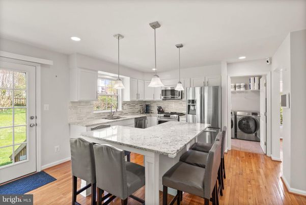 Interior, Kitchen, Pendant Lights, Recessed Lighting, Stainless Steel Appliances, Washer, Wood Texture Flooring