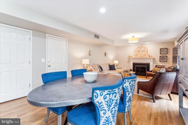 Dining room, Fireplace, Interior, Living room, Recessed Lighting, Wood Texture Flooring