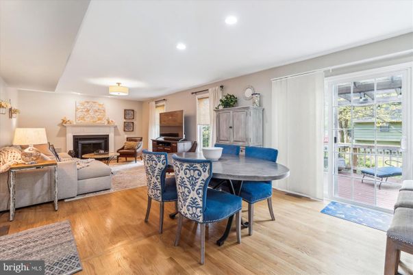 Dining room, Fireplace, Interior, Living room, Piano, Recessed Lighting, Wood Texture Flooring