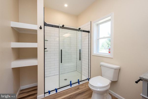 Bathroom, Glass Shower, Interior, Recessed Lighting, Wood Texture Flooring