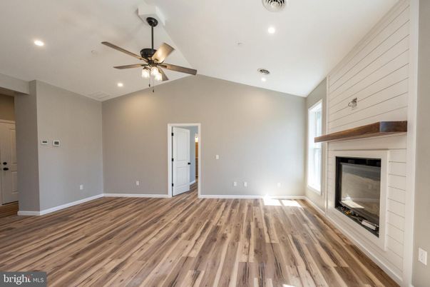 Empty room, Fireplace, Interior, Recessed Lighting, Wood Texture Flooring