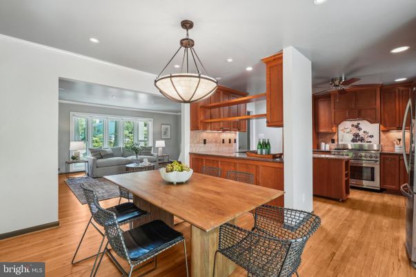 Dining room, Interior, Kitchen, Living room, Pendant Lights, Recessed Lighting, Stainless Steel Appliances, Wood Texture Flooring