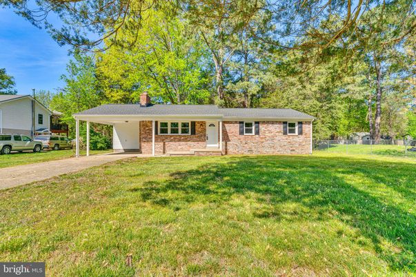 Attached, Backyard, Exterior, Facade, Brick Facade, Ranch