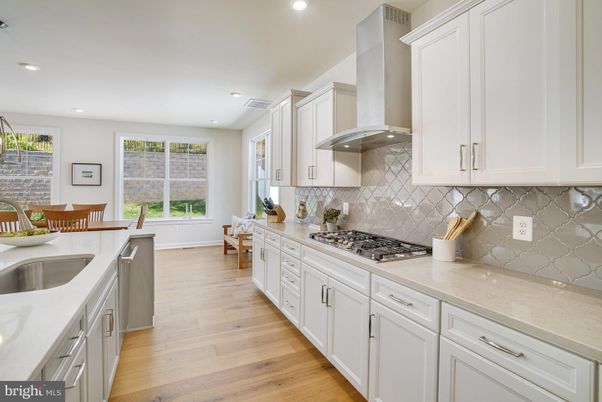 Dining room, Interior, Kitchen, Recessed Lighting, Stainless Steel Appliances, Wood Texture Flooring