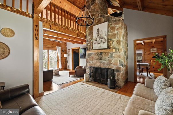 Chandelier, Fireplace, Interior, Living room, Pendant Lights, Wooden Beams, Wooden Ceilings, Wood Texture Flooring, Wooden Walls