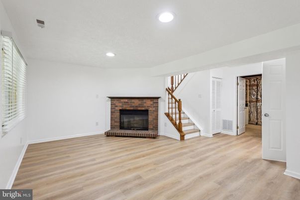 Empty room, Fireplace, Interior, Recessed Lighting, Wood Texture Flooring