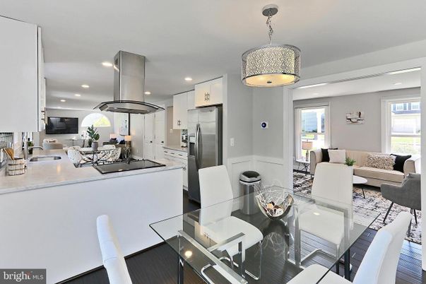 Dining room, Interior, Kitchen, Living room, Recessed Lighting, Stainless Steel Appliances, Wood Texture Flooring