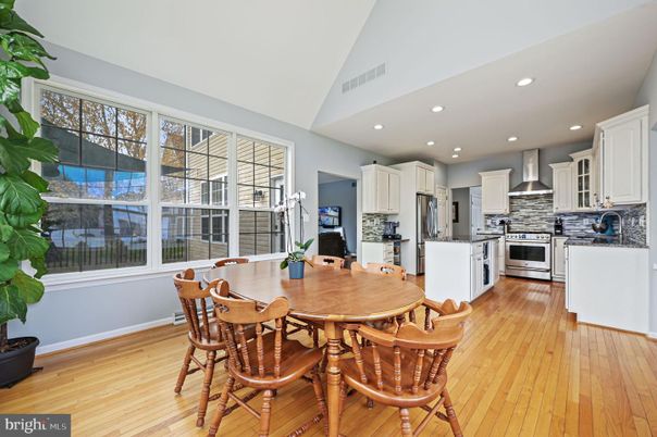 Dining room, Interior, Kitchen, Recessed Lighting, Stainless Steel Appliances, Wood Texture Flooring