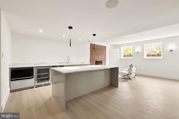 Fireplace, Interior, Kitchen, Pendant Lights, Recessed Lighting, Stone Walls, Wood Texture Flooring