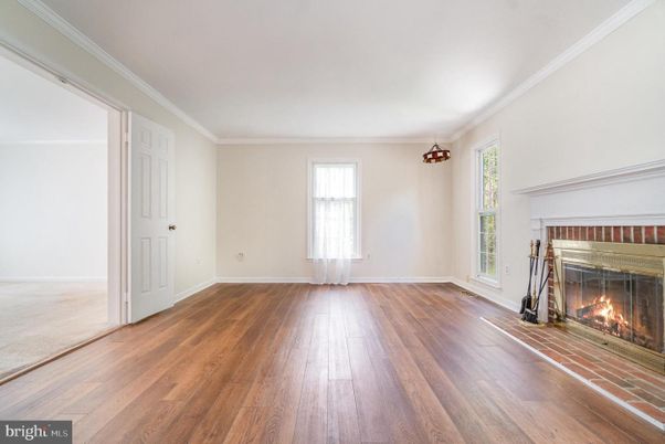 Empty room, Fireplace, Interior, Pendant Lights, Wood Texture Flooring