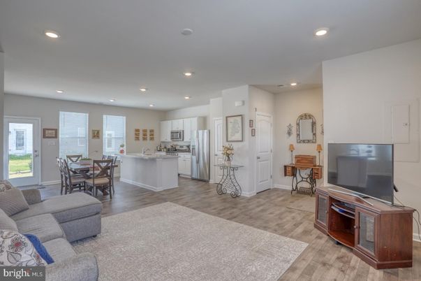Dining room, Interior, Kitchen, Living room, Recessed Lighting, Stainless Steel Appliances, Wood Texture Flooring