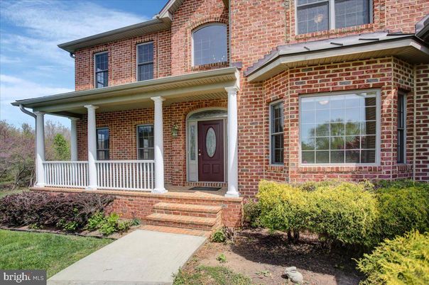 Exterior, Facade, Brick Facade, American Foursquare