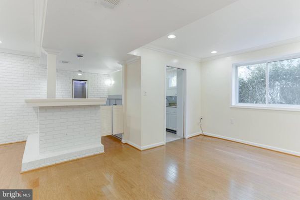 Empty room, Fireplace, Interior, Pendant Lights, Recessed Lighting, Wood Texture Flooring