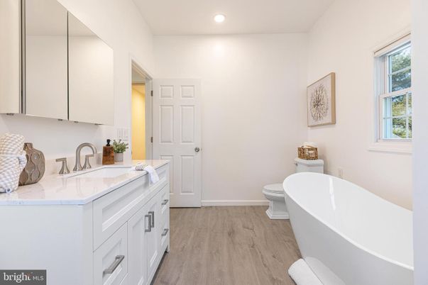 Bathroom, Free Standing Baths, Interior, Recessed Lighting, Wood Texture Flooring