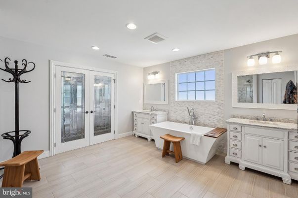Bathroom, Dual Sink Vanities, Free Standing Baths, Interior, Recessed Lighting, Wood Texture Flooring