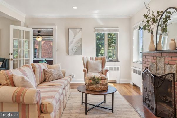 Fireplace, Interior, Living room, Recessed Lighting, Stone Walls, Wood Texture Flooring